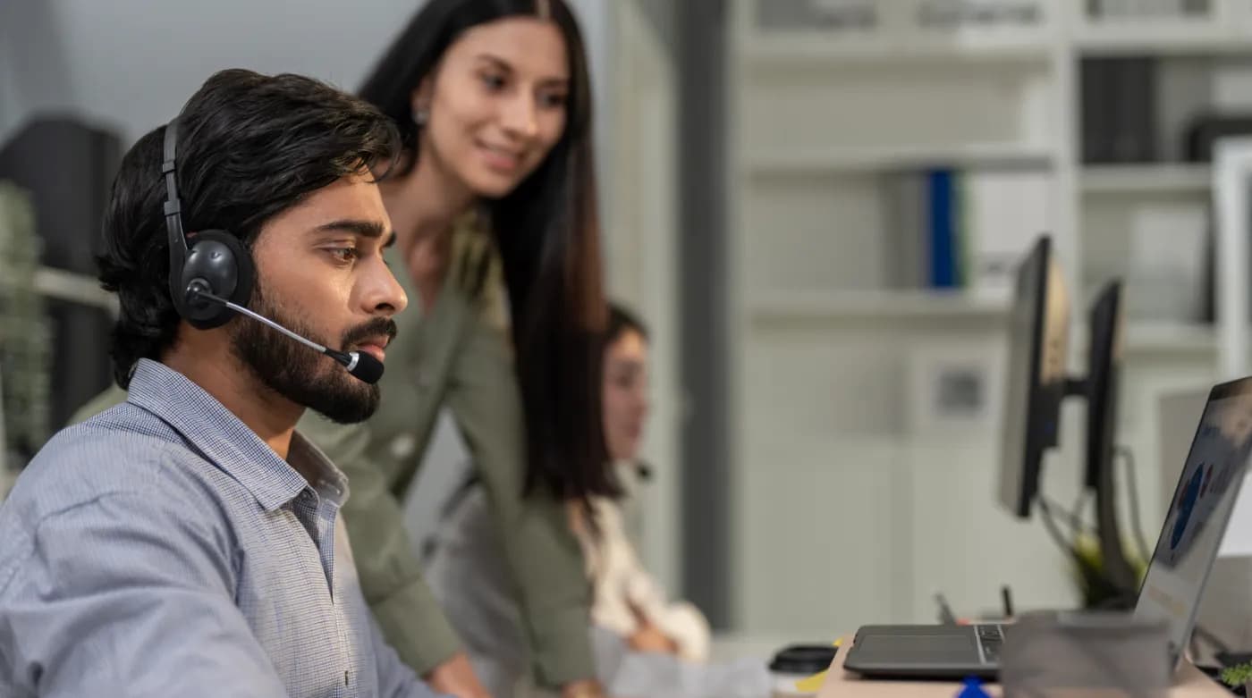 An NHHA advisor speaking with a learner on a call